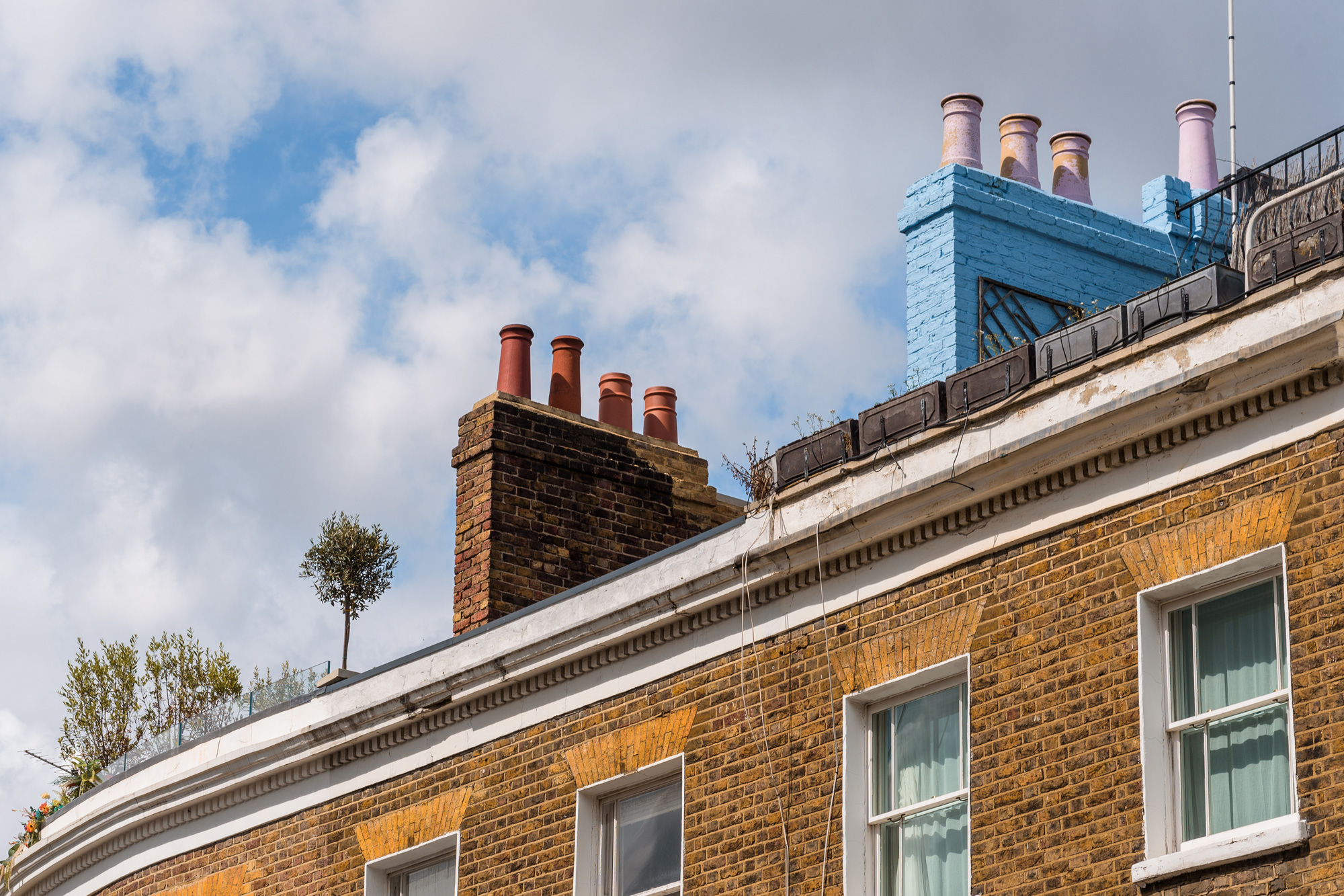 Chimneys on top of houses