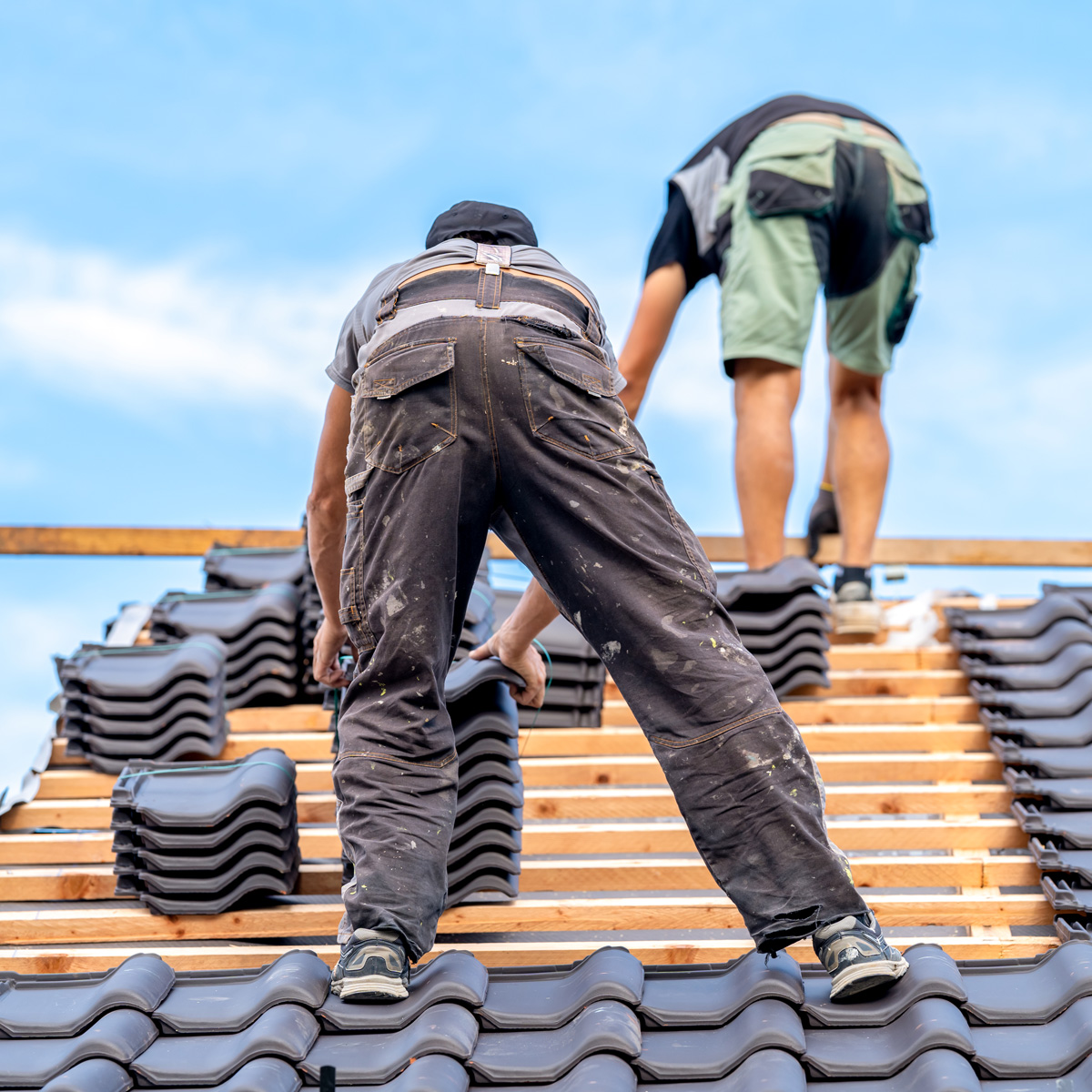 New roof tiles being placed down for a new roof installation